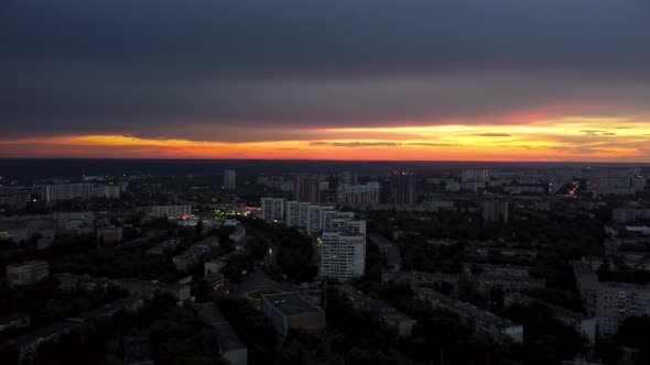 Epic aerial sunset in city residential district