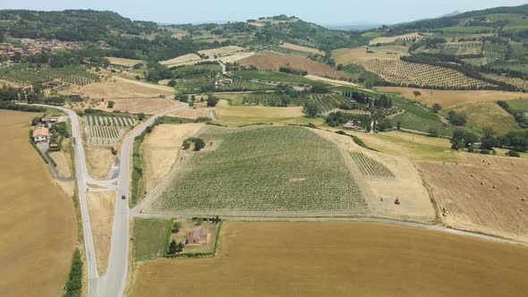 Aerial images of Tuscany in Italy cultivated fields summer,