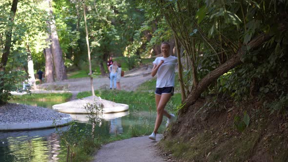 Woman Running Asphalt Road Summer Park