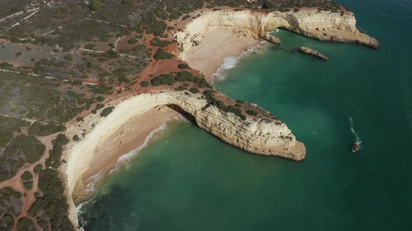 Aerial view of Praia do Pontal and Praia da Morena with tourist boat