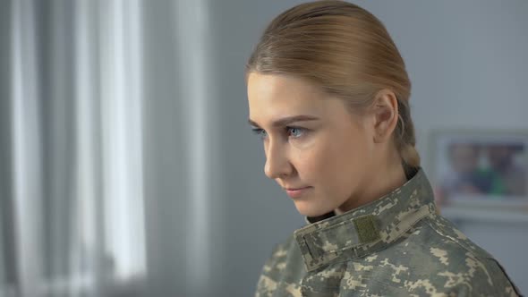 Confident Female Soldier Student Looking at Camera Standing Near Academy Window