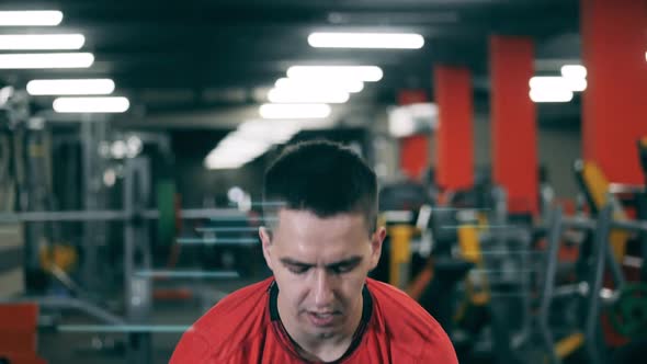 Sportsman Uses Gym Ball During Crossfit Workout