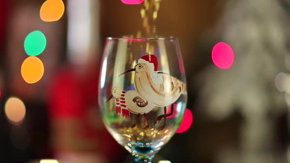 Unique Handmade Wine Glass with the Painting of Two Christmas Birds Under the Shower of Gold Sequins