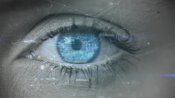 Digital composite of a woman eye looking at the blockchain technology