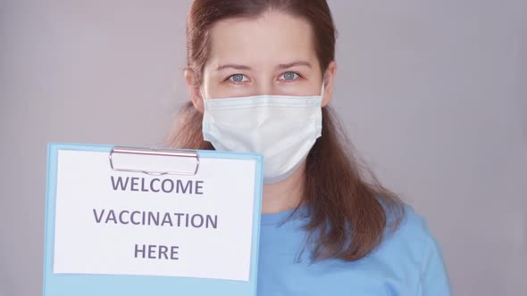 Young Nurse Invites to Vaccination