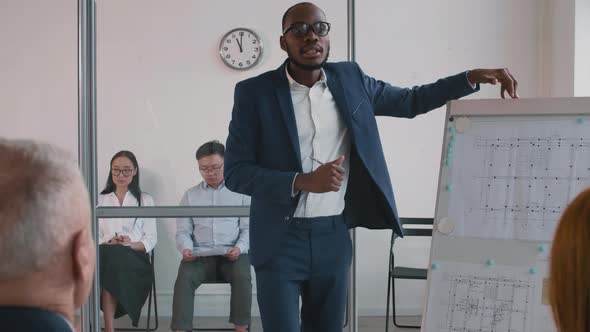 Young African Man Making Business Presentation