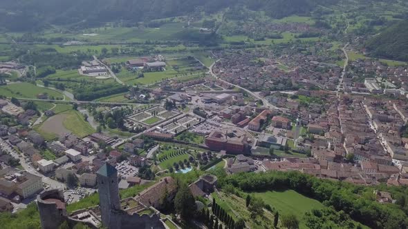 Aerial panoramic view of Borgo Valsugana in Trentino Italy with views of the city and mountains, dro