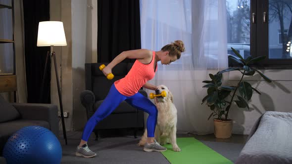 Sporty Fit Woman with Dog Assistant Training Arms