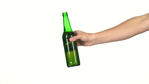 Hand with a Bottle of Beer. White Background