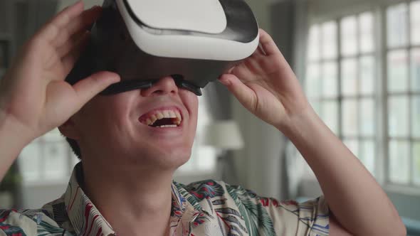Man Explores Virtual Reality In Living Room