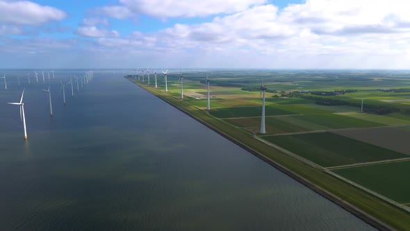 Wind Turbines in the Early Morning Wind Mill Park in the Netherlands