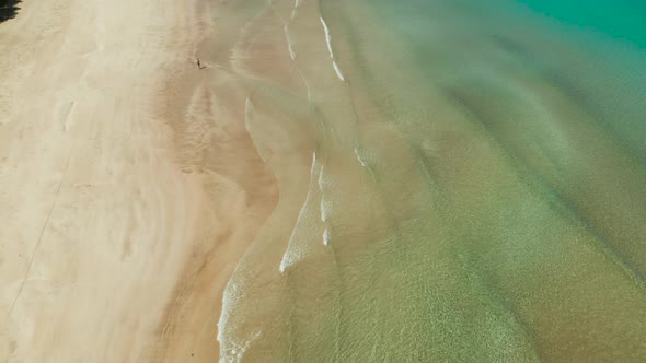 Ocean with Waves and Yellow Beach