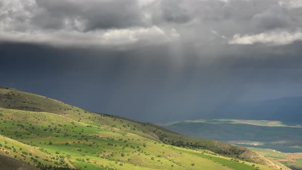 Storm Clouds and Rain Approaching to Lowland Geography