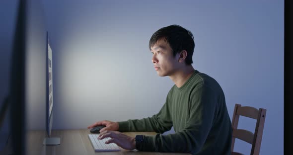 Man work on computer at home