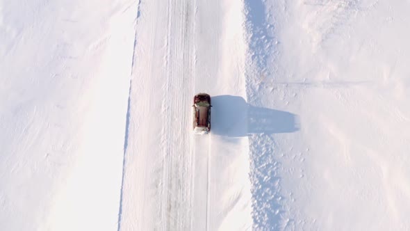 Car Riding On Winter Path