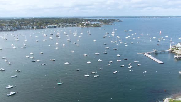 Boats And Yachts On Water Surface At Marblehead Harbor In New England, Massachusetts With American F