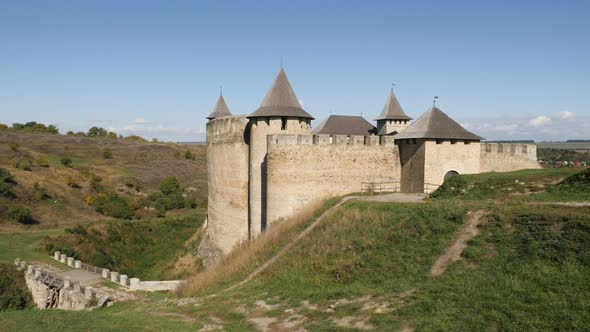 Khotyn Fortress behind a hill