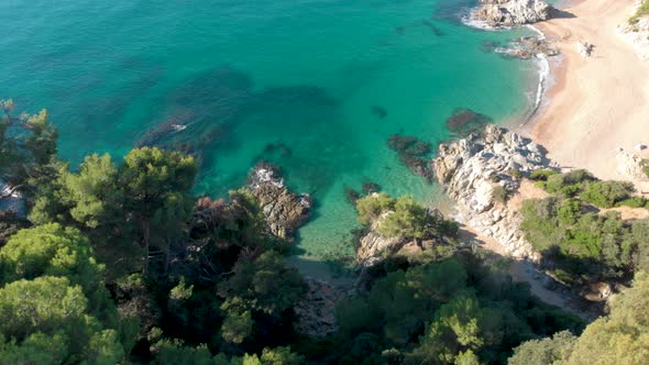 Costa Brava beach, aerial drone, paradise, turquoise green - Lloret de Mar Mediterranean - Spain