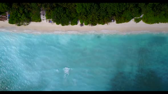 Aerial landscape of marine coastline beach voyage by aqua blue ocean and white sandy background of j