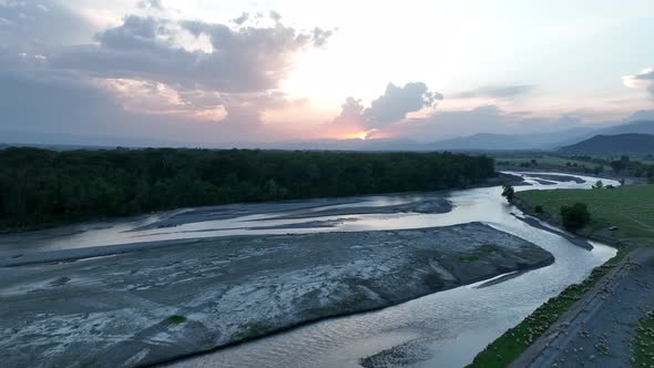 Flying over Alazani river at sunset. Kvareli, Georgia 2022 summer