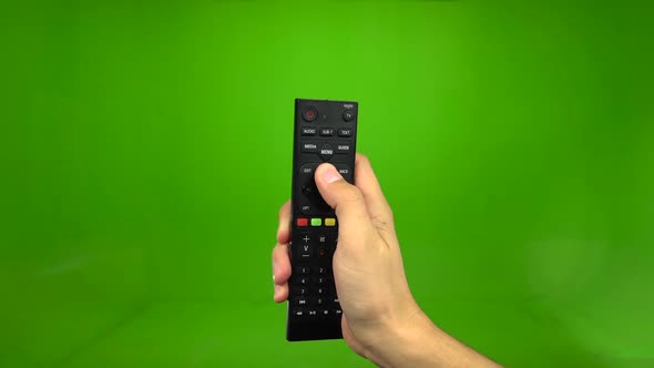 Remote Control Television Changing One Channel . Green Screen