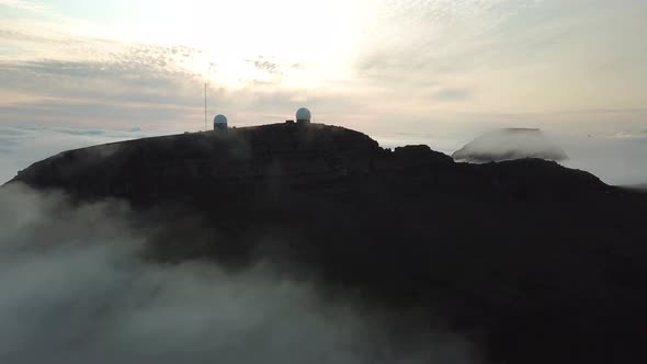 Aerial View of Amazing Mist Faroese Nature Foggy Green Hills and Rocky Cliffs