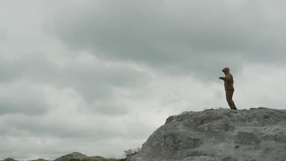 A Man Is Jumping Rope High In The Mountains.