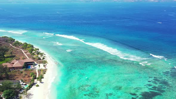 Aerial view nature of relaxing lagoon beach adventure by blue sea with white sand background of a da