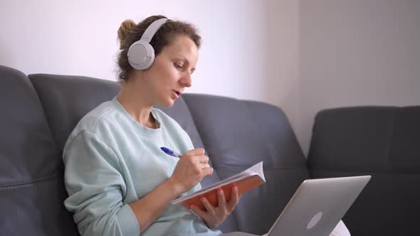 Close Up of Female Student Enjoying Remote Education From Home Devices