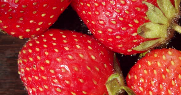 Fresh Strawberries, Rotating Slowly. Macro Close Up. Rotate Top View