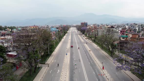 An aerial flight over the empty ring road in the city of Kathmandu, Nepal.