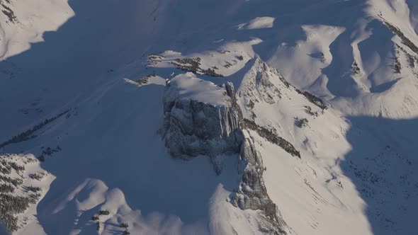 Aerial View of Canadian Mountain Covered in Snow