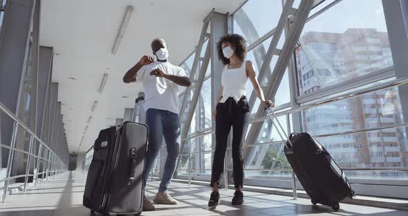 Afro American Young Couple, Husband and Wife, Brother and Sister Arrived at Airport, Stand with