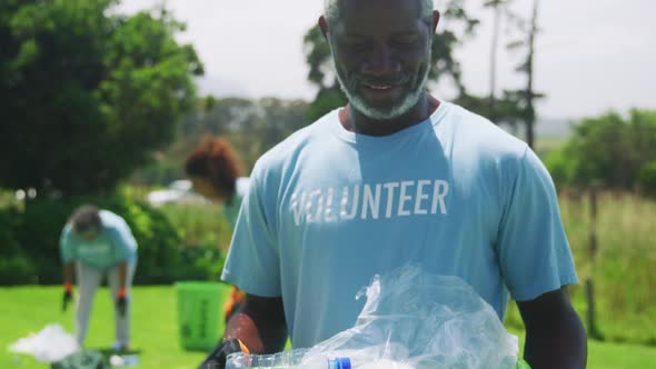 Volunteers collecting rubbish and recycling