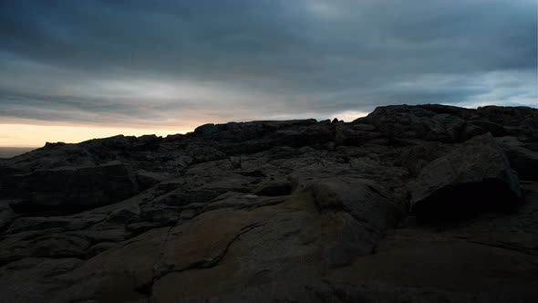 Rocky Coastline Under Cloudy Sky In Stokksnes