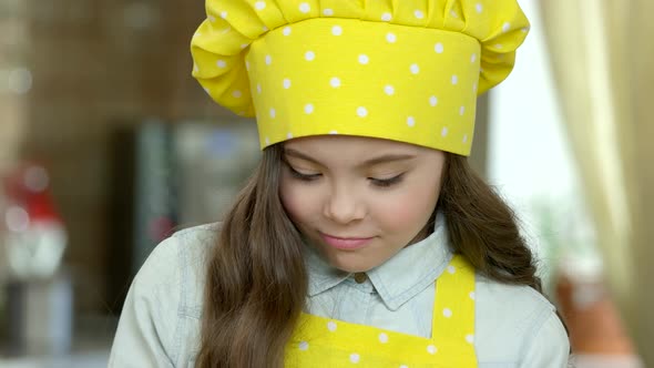 Girl in Chef Hat.