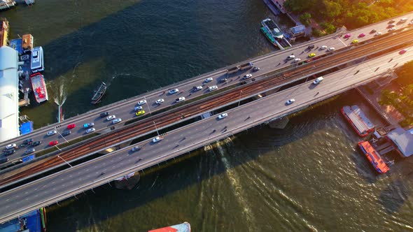 4K : Drones fly over the Chao Phraya River, buildings and business districts in Bangkok