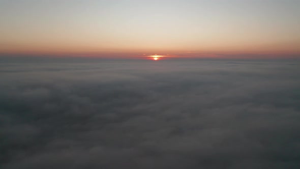 Video over а morning calm sea with low clouds