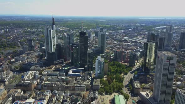 AERIAL Above Frankfurt Am Main with Drone Looking Down on Skyscrapers in Beautiful Summer Sunshine