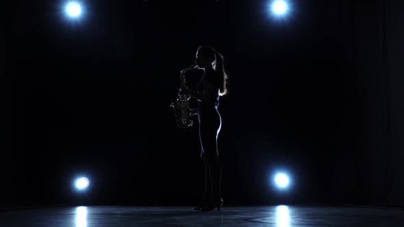 Solo Concert of Female Playing on Saxophone in Slow Motion