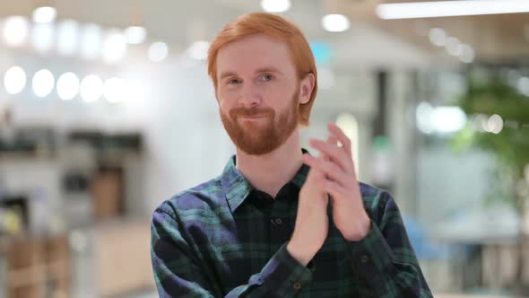 Portrait of Beard Redhead Man Applauding Clapping