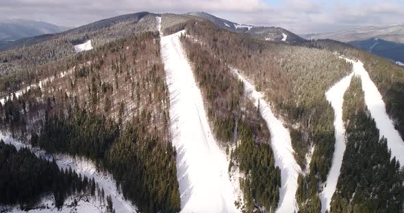 Aerial View of the Ski Resort in Mountains at Winter