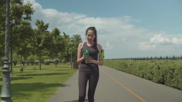 Fit Woman Drinking Energy Drink After Hard Workout