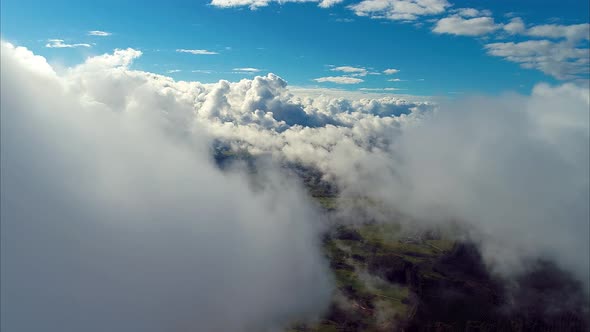 Fog morning at downtown district. Above the clouds.