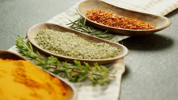 Various spices with herbs in a tray 4k