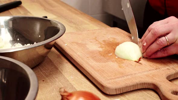 Chef Cutting Onion for the Future Dish