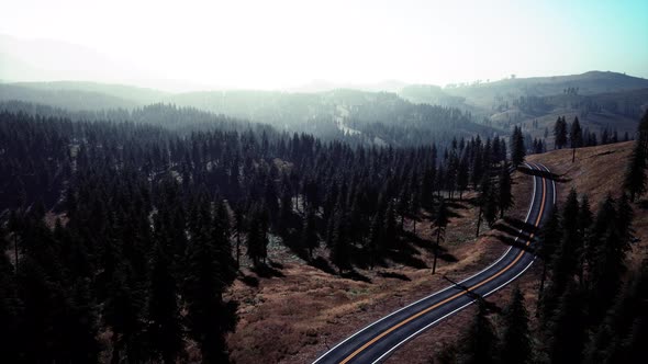 Aerial View of the Old Road Going Through Pass in the Swiss Alps