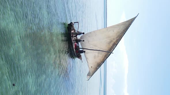 Tanzania Vertical Video  Boat Boats in the Ocean Near the Coast of Zanzibar Aerial View