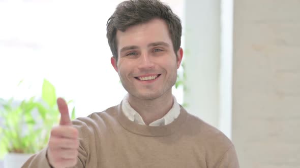 Portrait of Man Showing Thumbs Up Sign