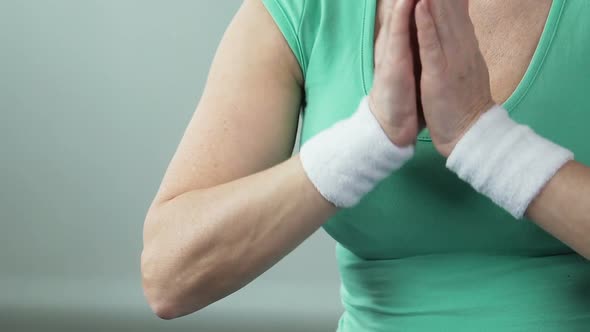 Aged Female Putting Palms One Against Another in Yoga Lotus Position, Hobby